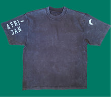 Load image into Gallery viewer, FRONT: This is a dyed box tee w/ african on right sleeve &amp; half moon on the left sleeve.
